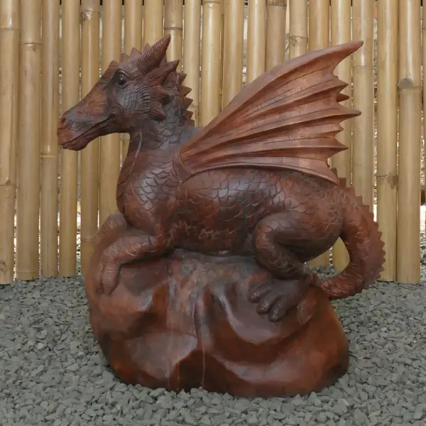 Product image 7 of the product “Dragon with leg lifted on the right made from suar wood, about 50cm Height ”